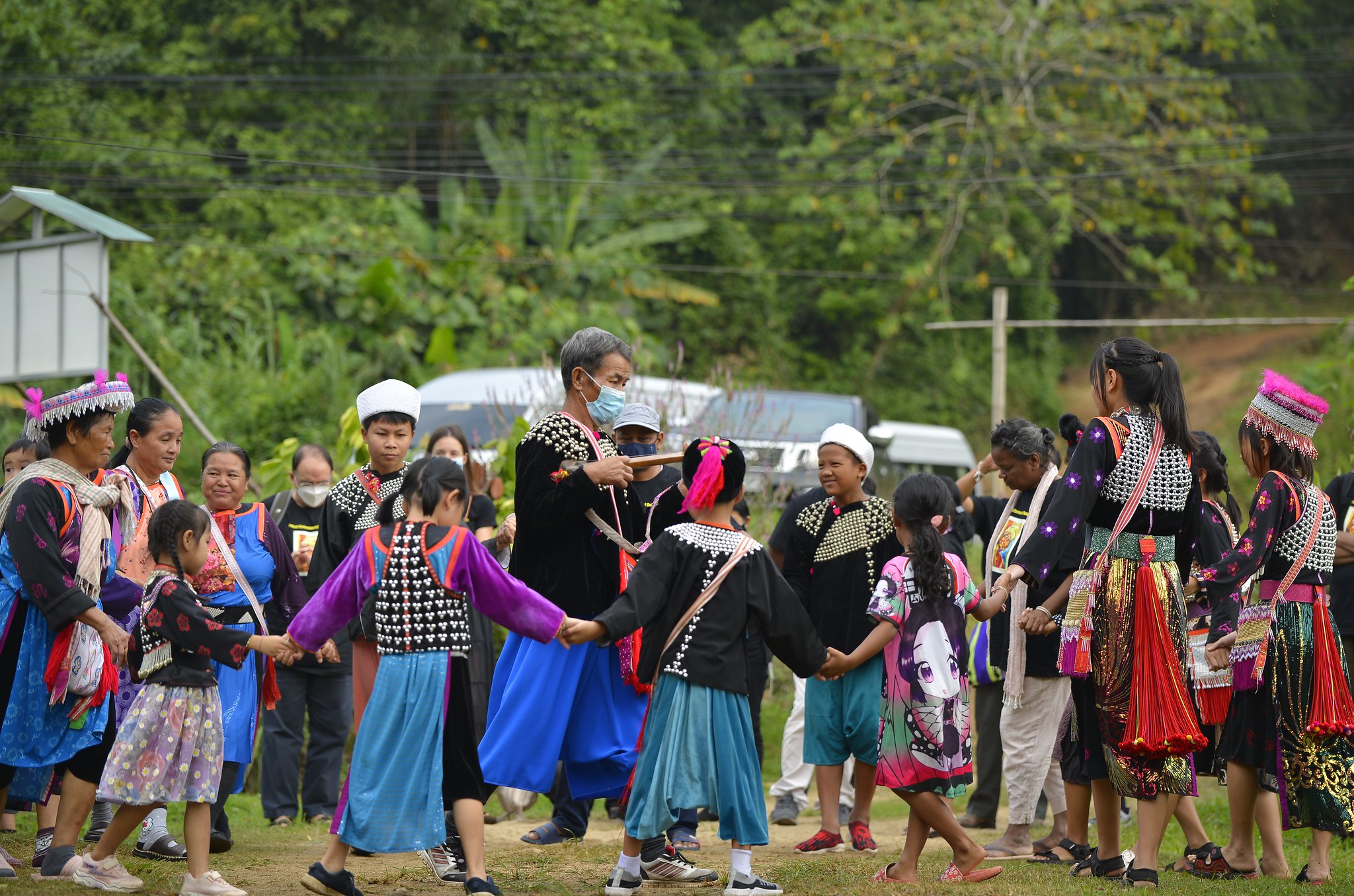 The Lisu Indigenous Peoples including men, women, youth, and children of Pang Sa village are performing their traditional dance. Pang Sa village is in the Chiang Rai Province of Thailand. Photo by Lakpa Nuri Sherpa, Asia Indigenous Peoples Pact (AIPP)