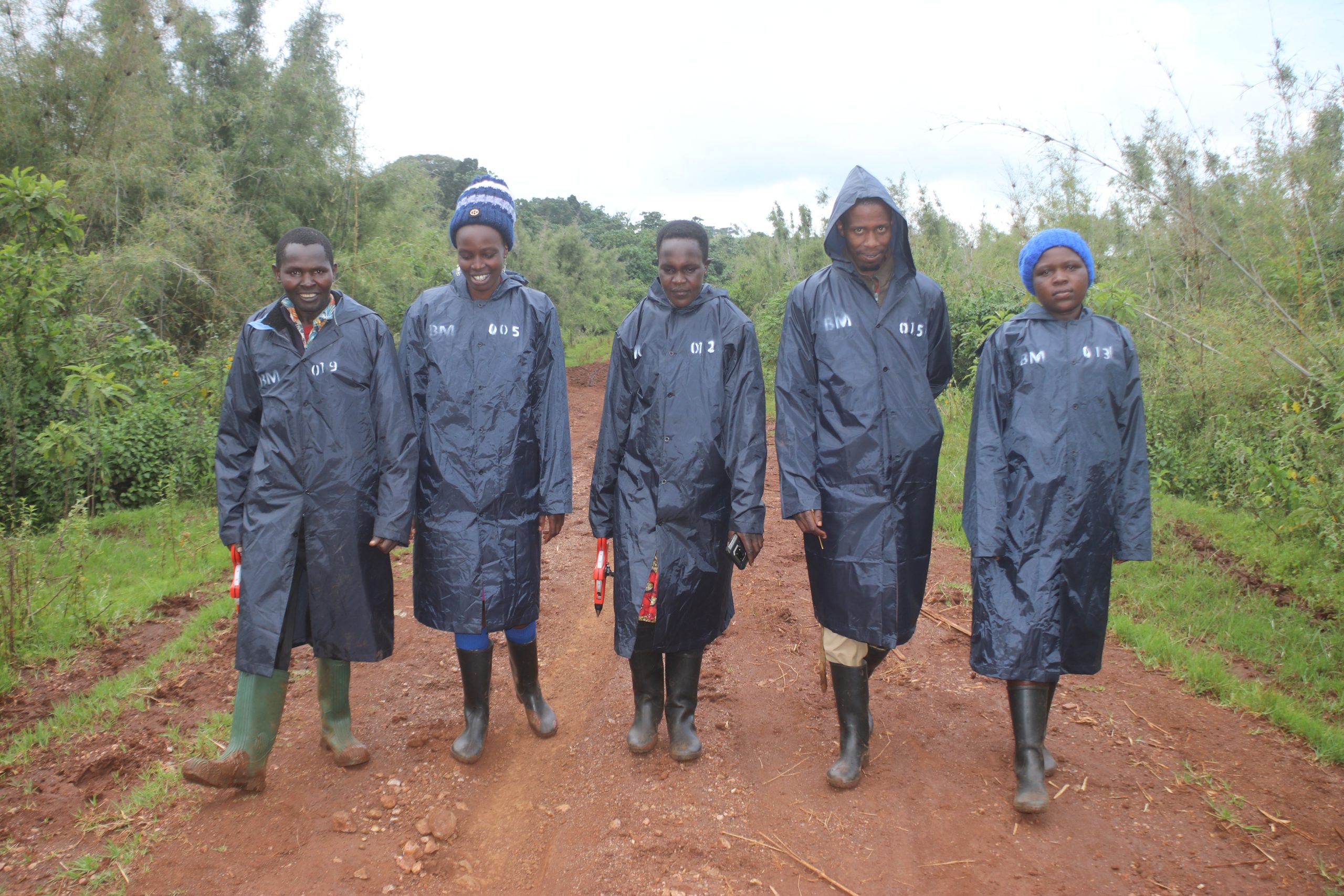 A section of community monitors en-route to collect data using quadrats in the bamboo zone